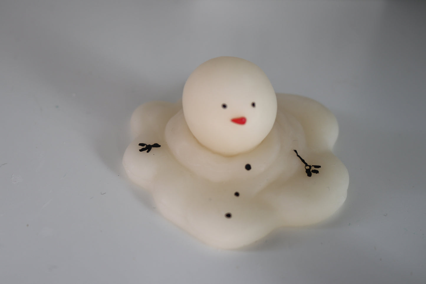 Melting Snowman Candle